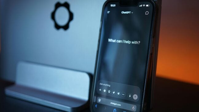 A smartphone showing the ChatGPT welcome screen